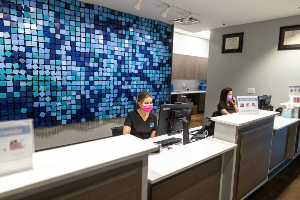 Front desk and reception area at the Gladwell Orthodontics North Raleigh office on Strickland Road